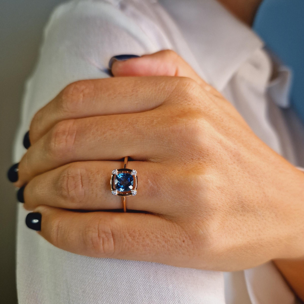 Gold ring with topaz