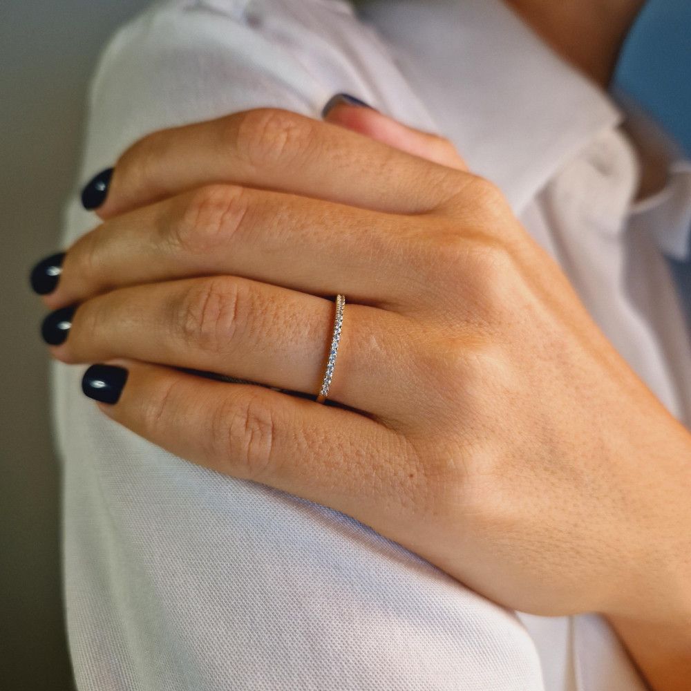 Golden ring with zircon