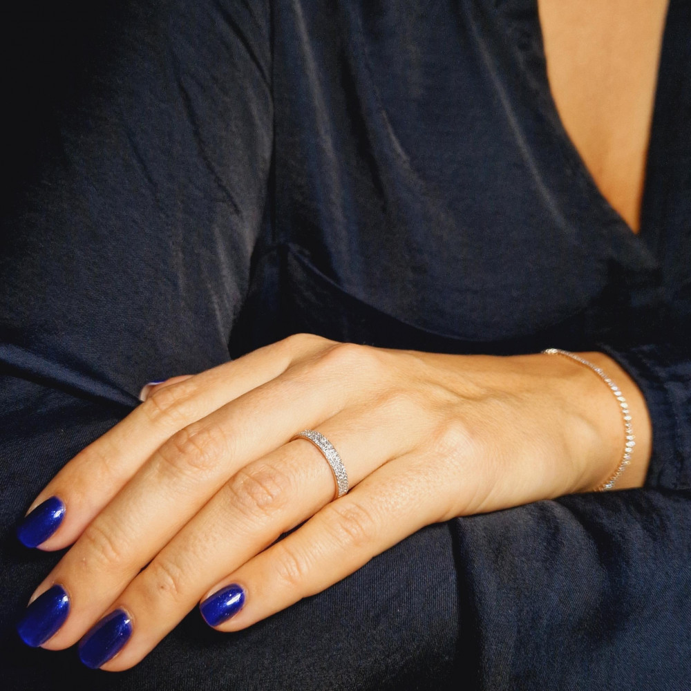 Golden ring with precious stones