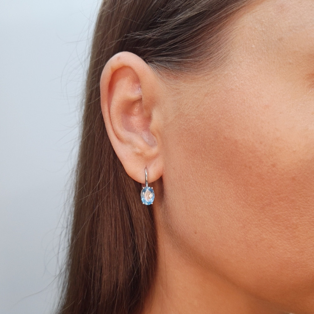 Gold earrings with topaz