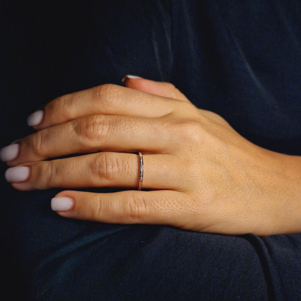 Golden ring with precious stones