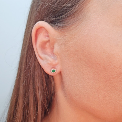 Gold earrings with emerald