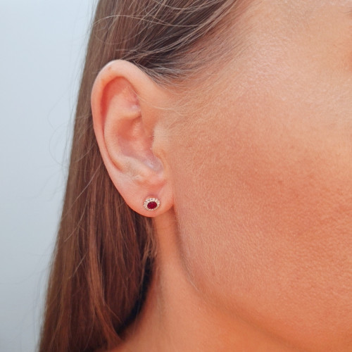 Gold earrings with a ruby