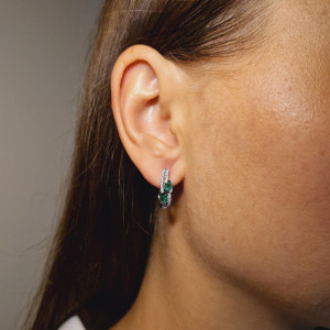 Gold earrings with emerald