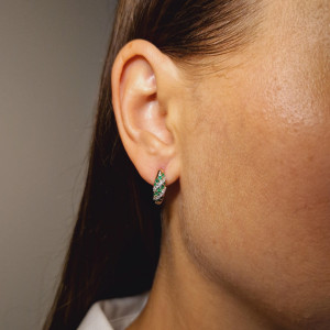 Gold earrings with emerald