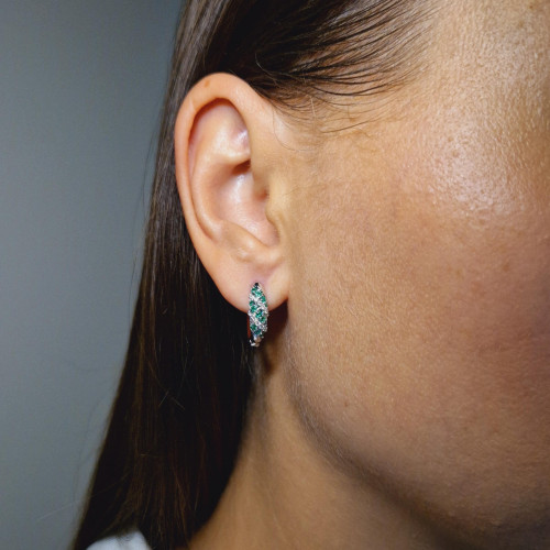 Gold earrings with emerald