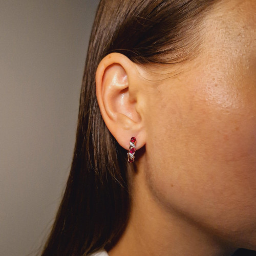 Gold earrings with a ruby