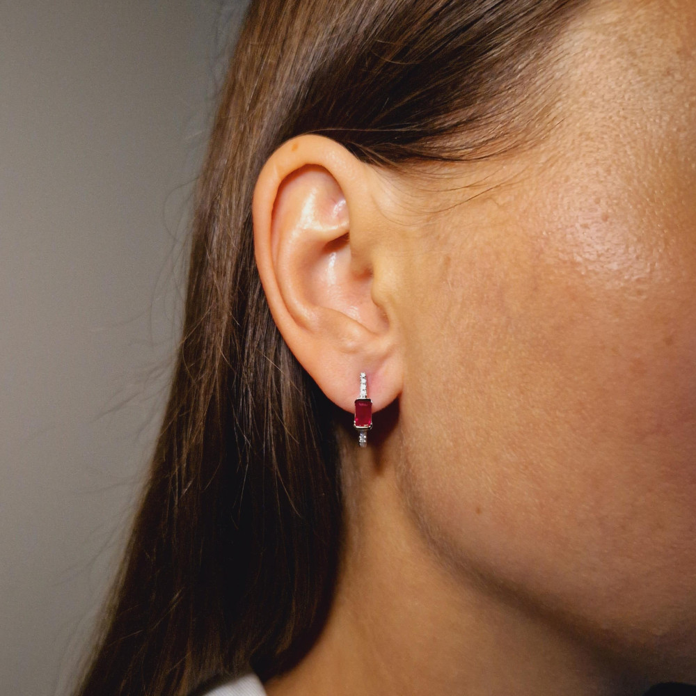 Gold earrings with a ruby