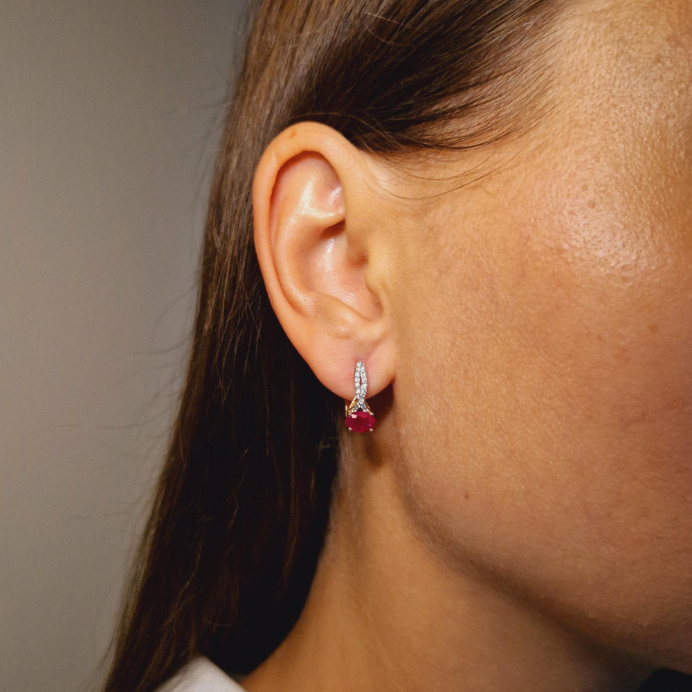 Gold earrings with a ruby