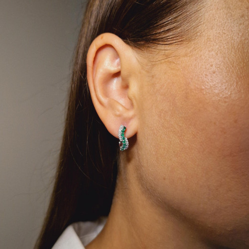 Gold earrings with emerald