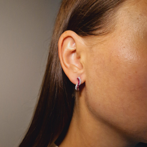 Gold earrings with a ruby