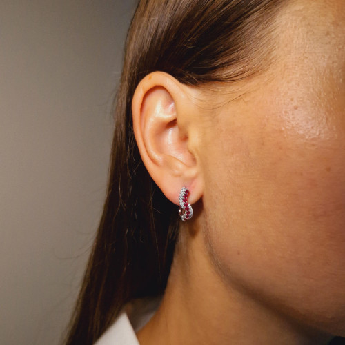 Gold earrings with a ruby