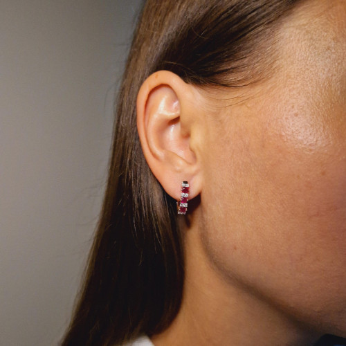 Gold earrings with a ruby