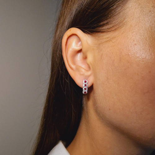 Gold earrings with a ruby