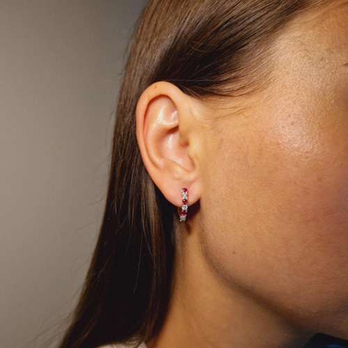 Gold earrings with a ruby