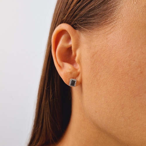 Gold earrings with a black diamond