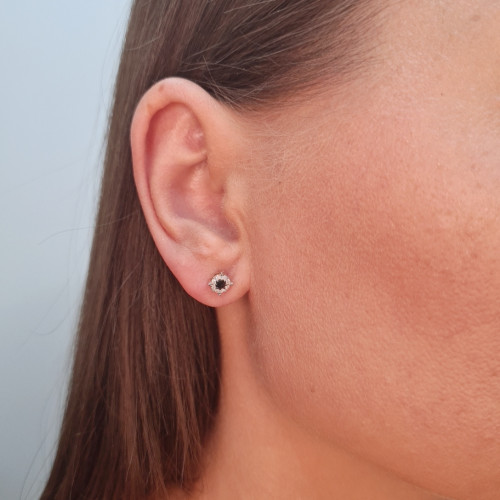 Gold earrings with a black diamond