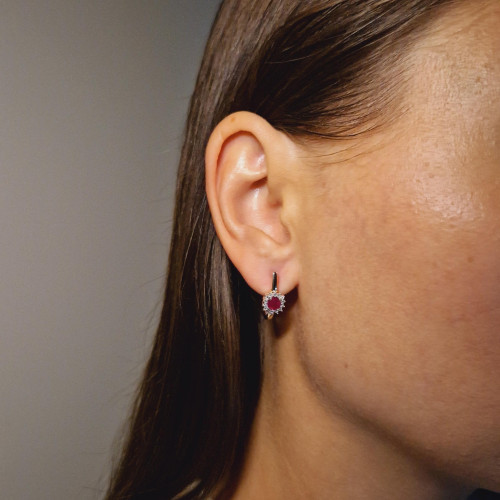 Gold earrings with a ruby