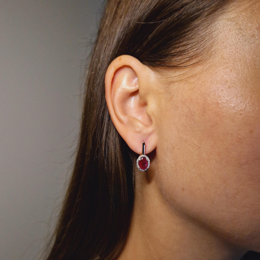 Gold earrings with a ruby