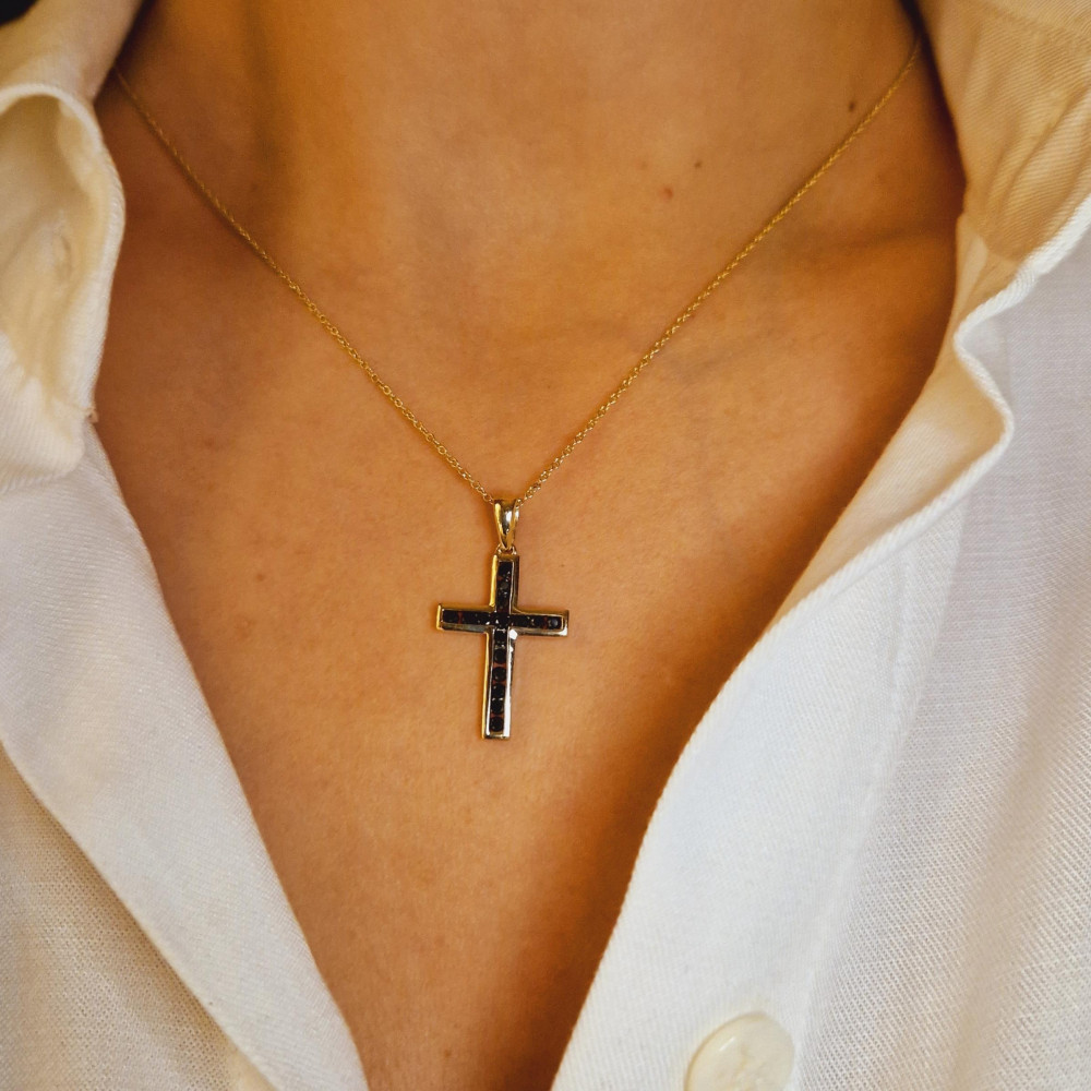 Golden pendant with precious stones 