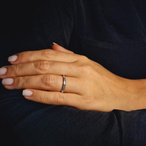 Golden ring with precious stones