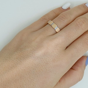 Golden ring with zircon