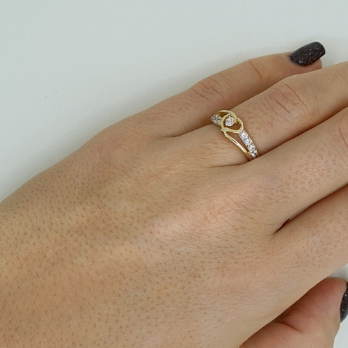 Golden ring with zircon