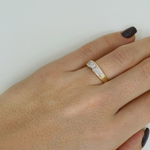 Golden ring with zircon