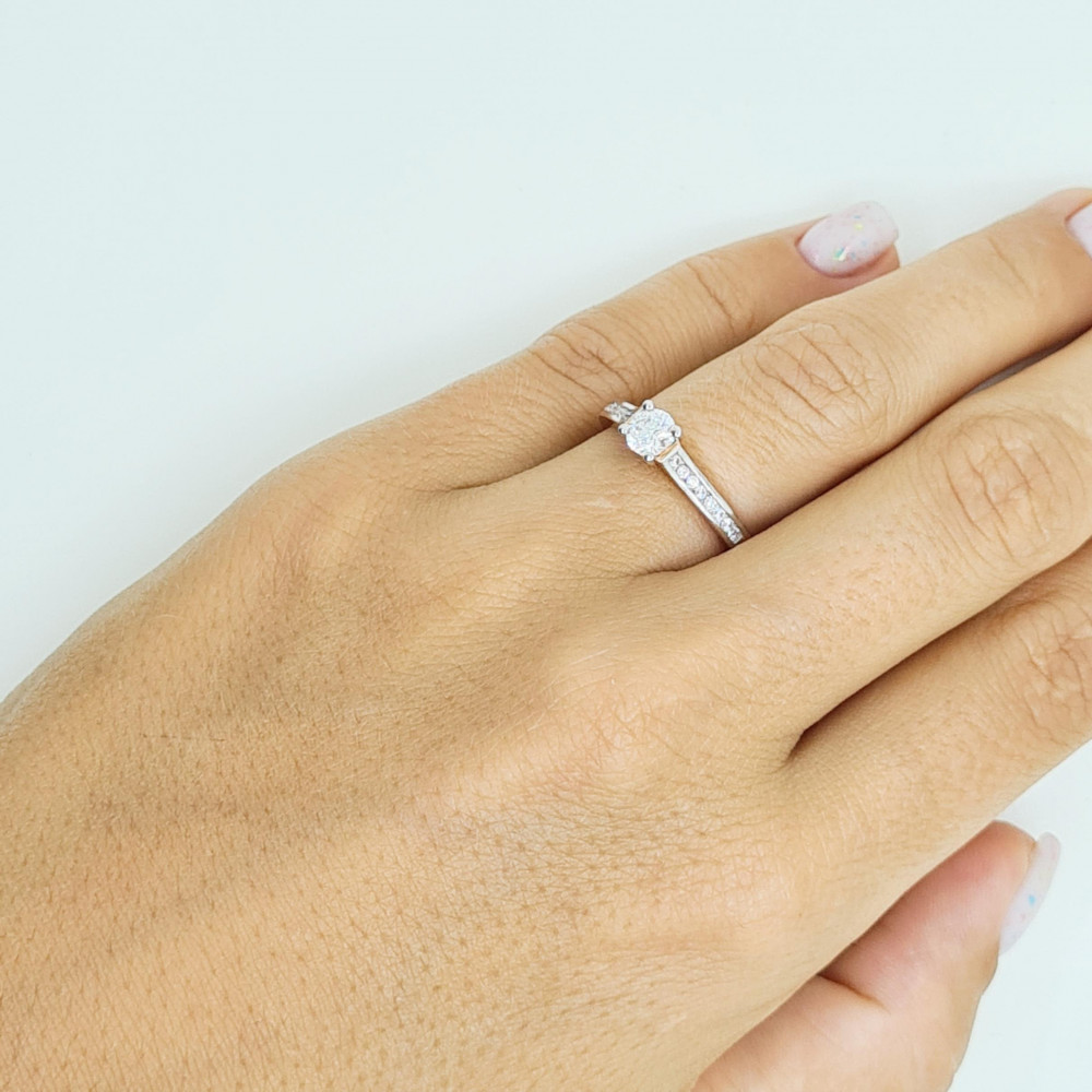 Golden ring with zircon