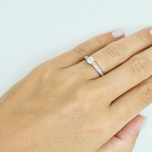 Golden ring with zircon