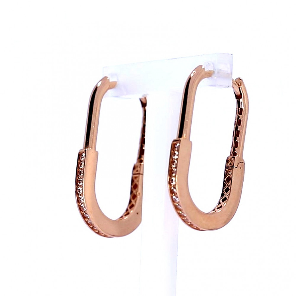 Gold earrings with zircon