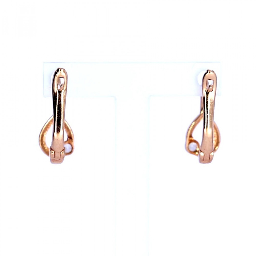 Gold earrings with zircon