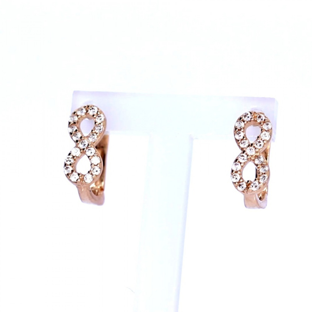 Gold earrings with zircon