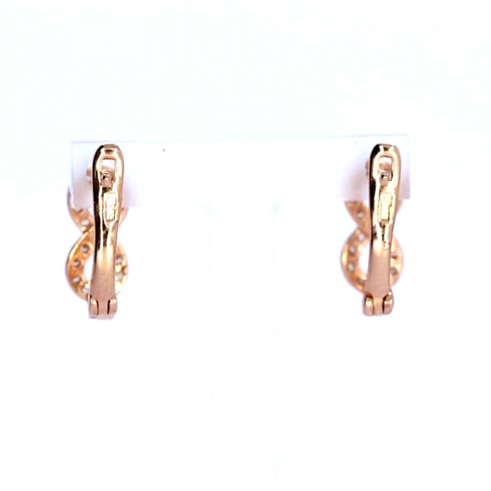 Gold earrings with zircon