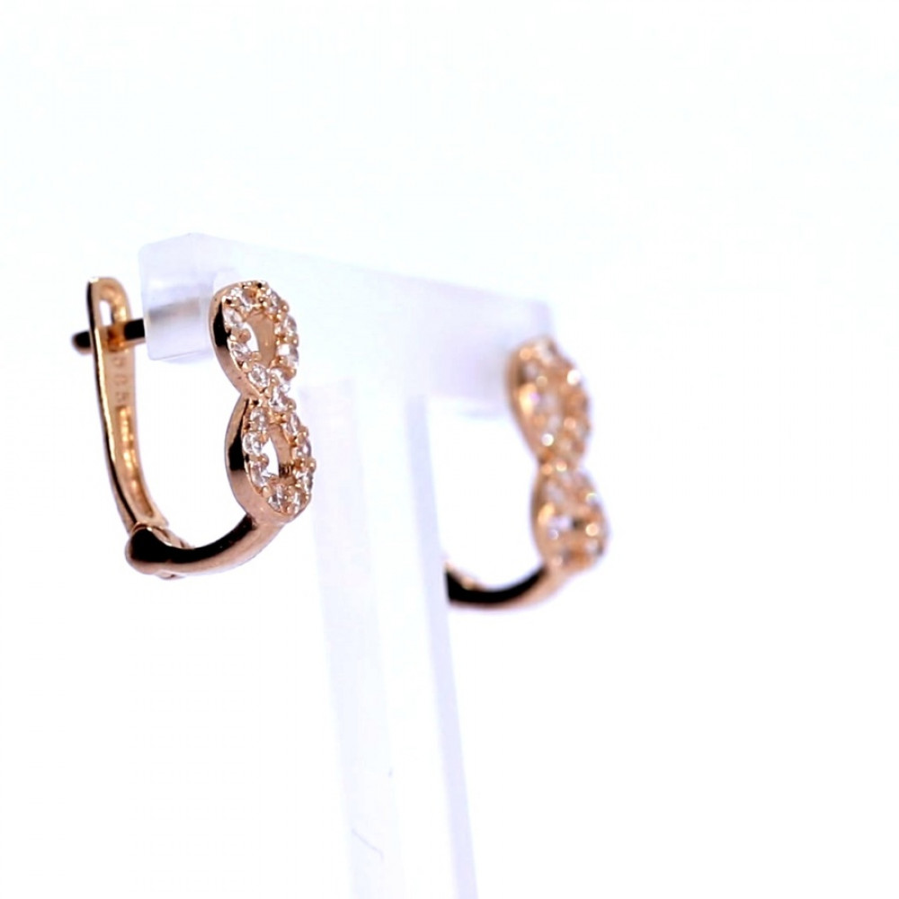 Gold earrings with zircon