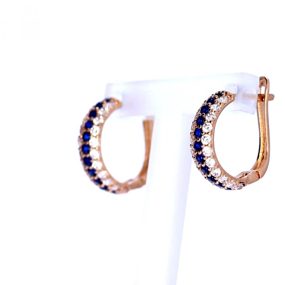 Gold earrings with zircon