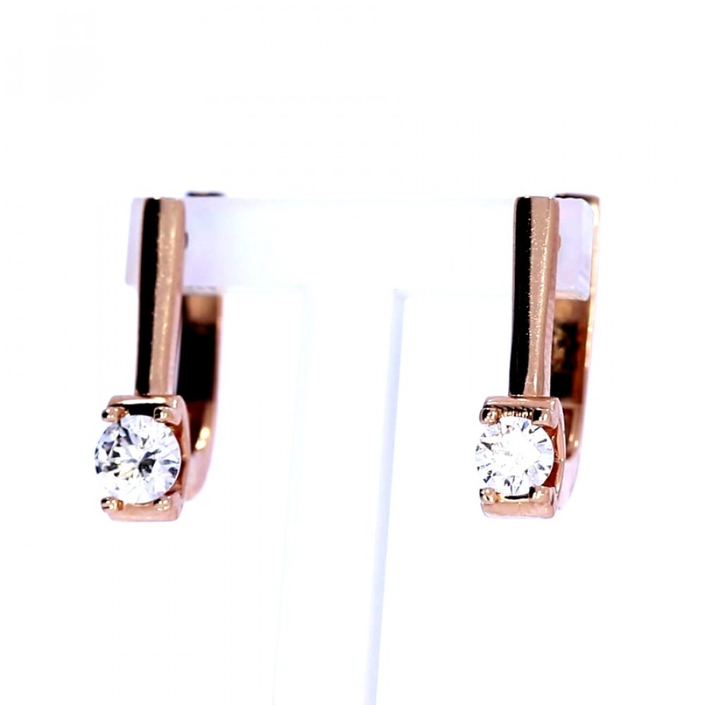Gold earrings with zircon