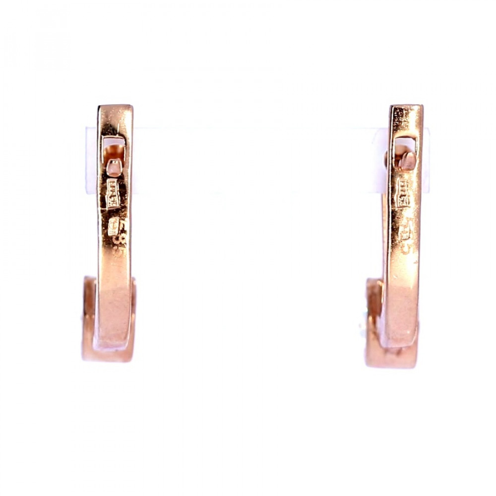 Gold earrings with zircon