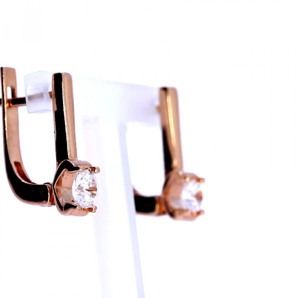 Gold earrings with zircon