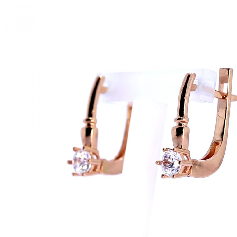 Gold earrings with zircon