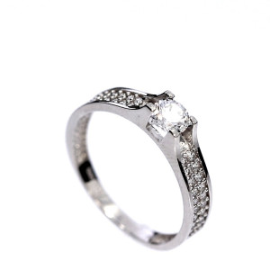 Golden ring with zircon