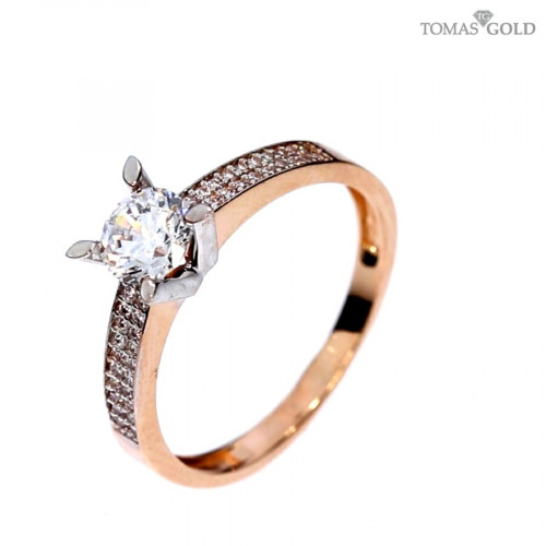 Golden ring with zircon