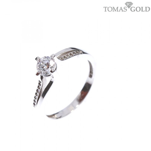 Golden ring with zircon