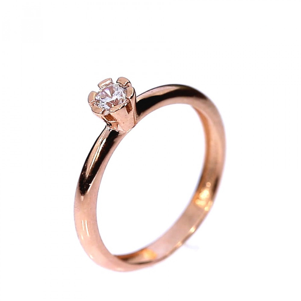 Golden ring with zircon