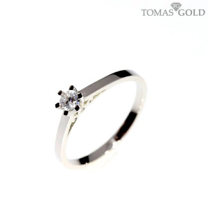 Golden ring with zircon