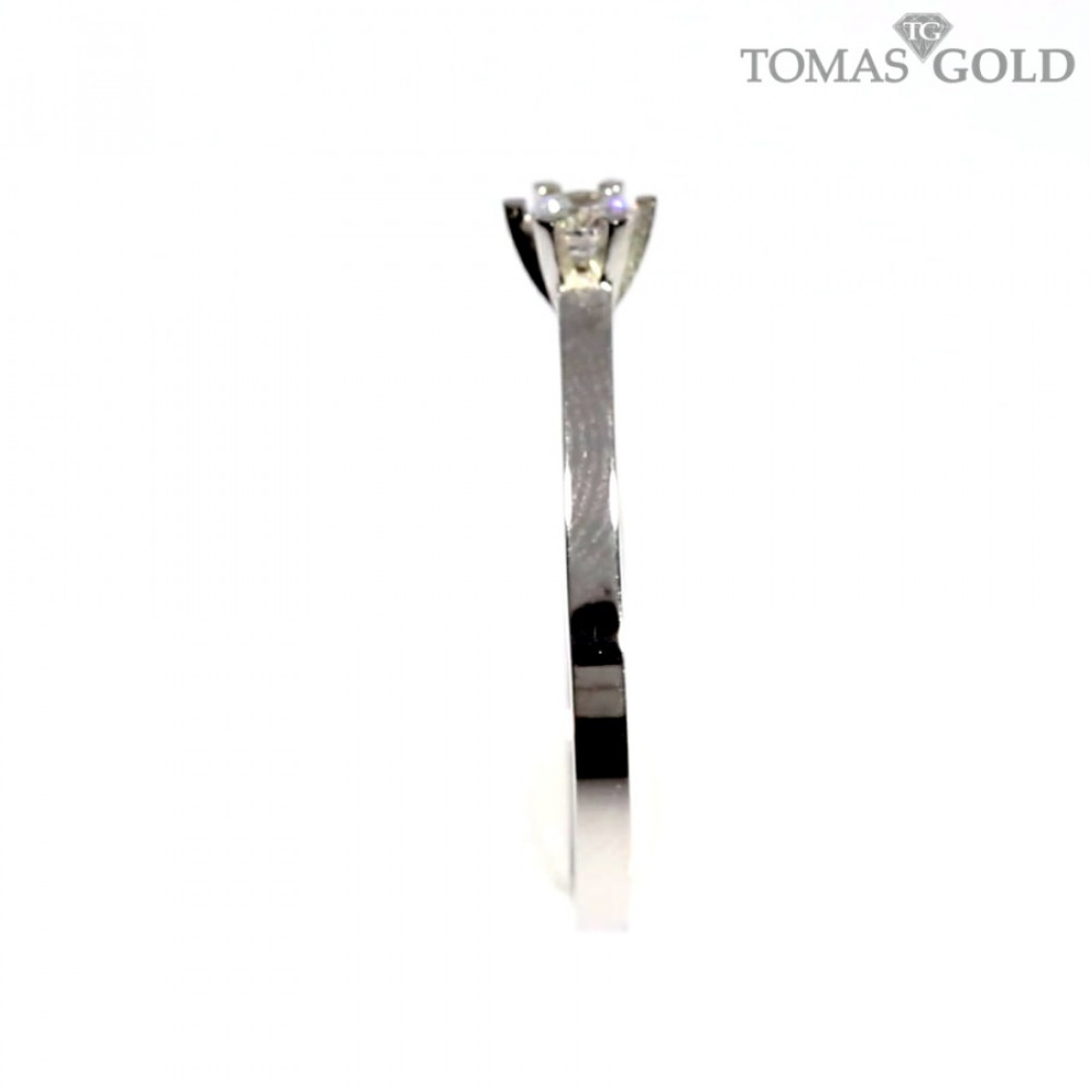 Golden ring with zircon