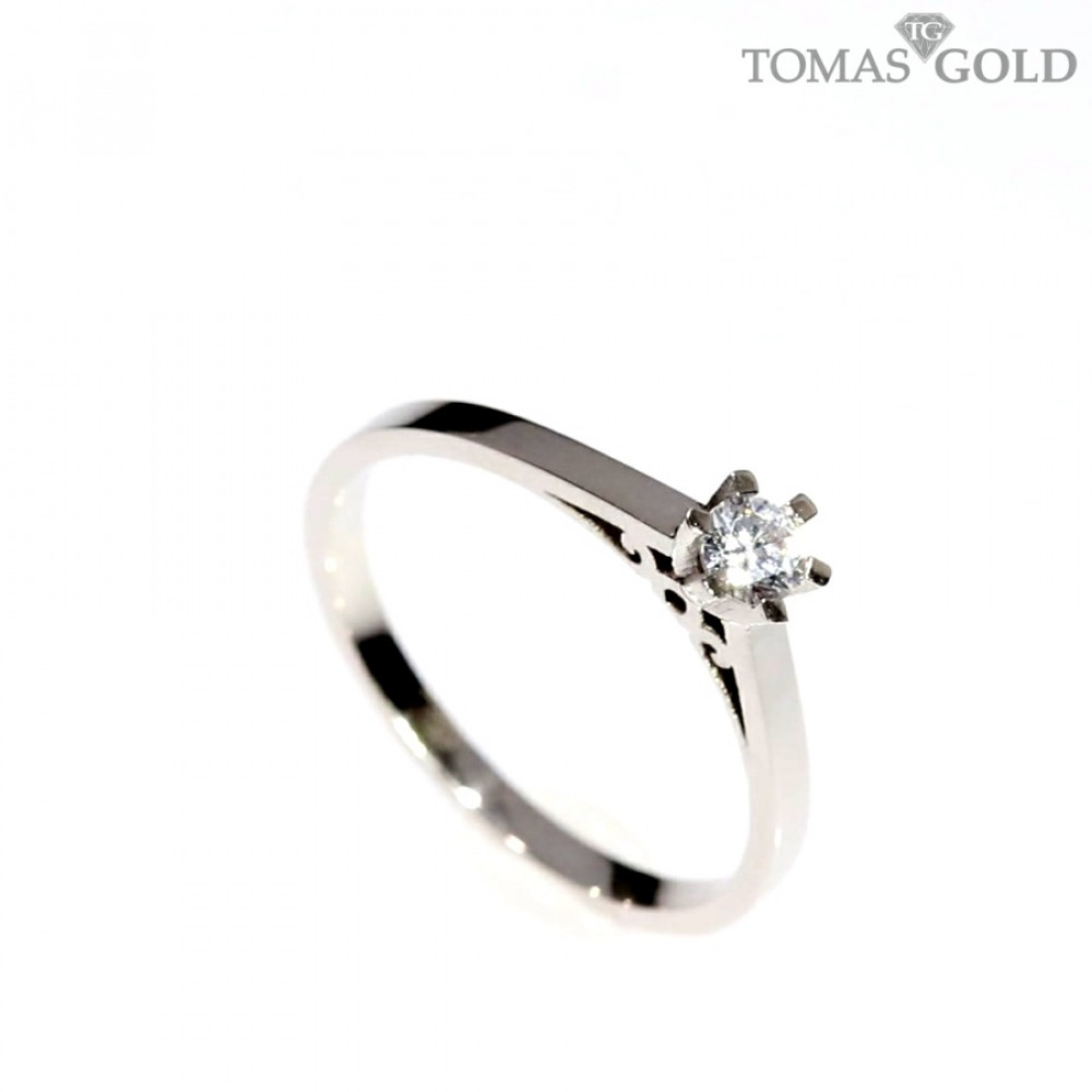 Golden ring with zircon