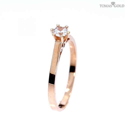 Golden ring with zircon