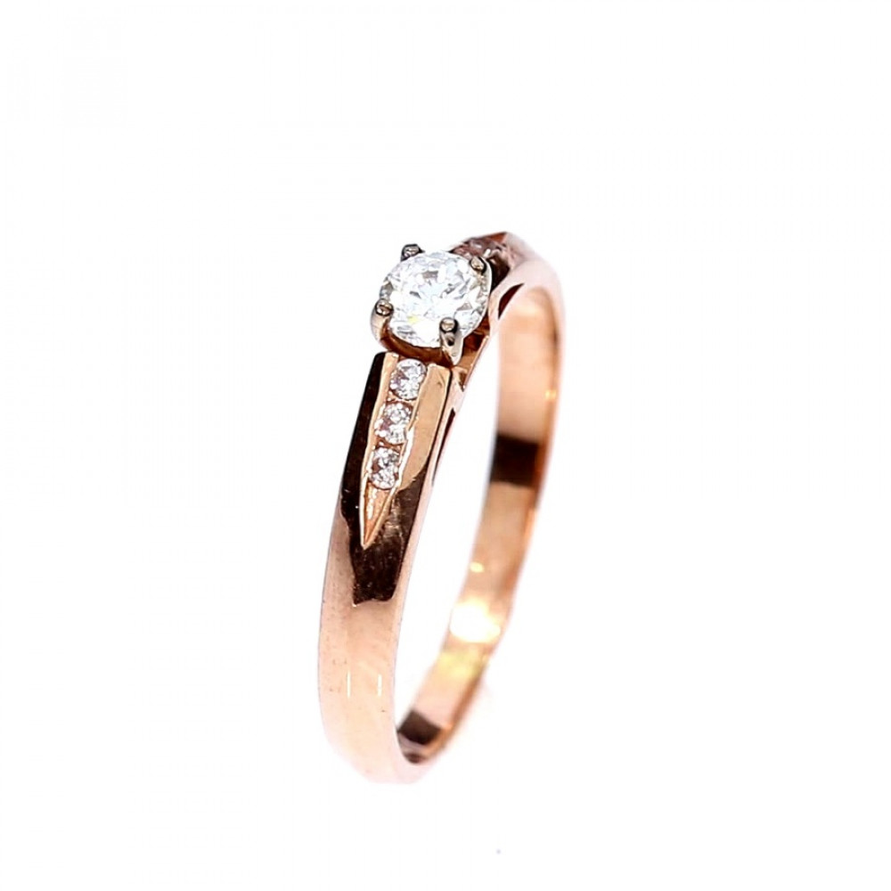 Golden ring with zircon