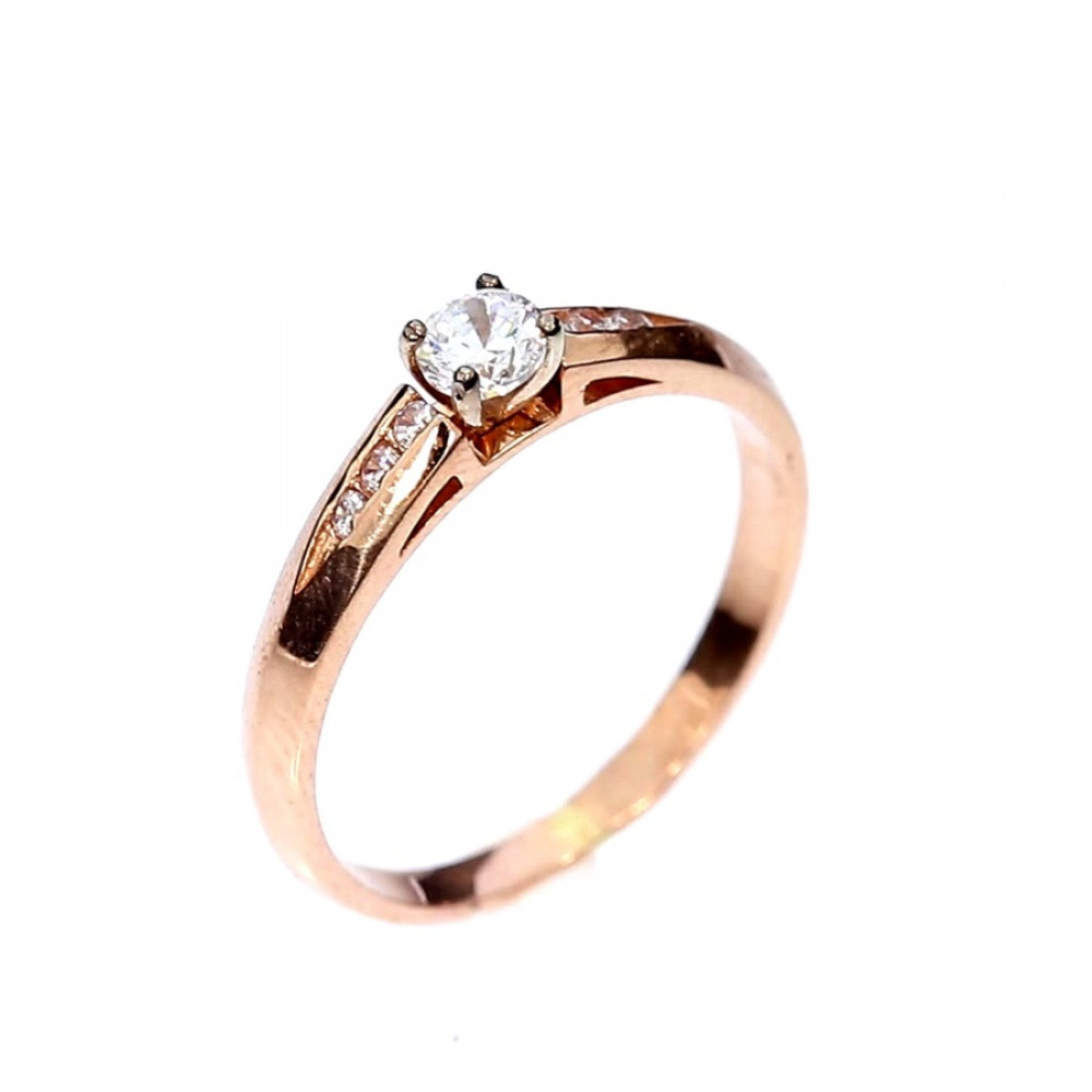 Golden ring with zircon